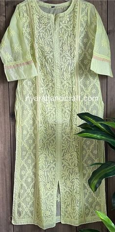 Elegant lime green color kurta on Kota Silk. Chikankari hand embroidery embellished with mukaish work. Kurta Fabric: Kota Silk Kurta Length- 47 inches Unstitched Yellow Kurta With Chikankari Embroidery, Yellow Chikankari Embroidered Straight Kurta, Designer Yellow Kurta With Chikankari Embroidery, Green Cutwork Kurta For Spring, Navratri Pista Green Kurta With Chikankari Embroidery, Spring Green Cutwork Kurta, Traditional Green Kurta With Cutwork, Pista Green Cotton Kurta With Chikankari Embroidery, Spring Pista Green Kurta With Chikankari Embroidery