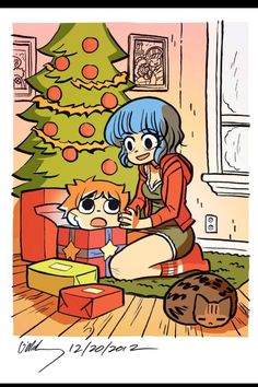 a woman sitting on the floor next to a christmas tree holding a box with a cat in it