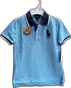 Blue Collared Polo Shirt Preppy Style, Preppy Blue Collared Polo Shirt, Preppy Blue Cotton Polo Shirt, Preppy Blue Polo Collar Top, Blue Collared Preppy Tops, Preppy Blue Collared Top, Blue Fitted Preppy Tops, Preppy Short Sleeve Blue Shirt, Preppy Blue Short Sleeve Shirt