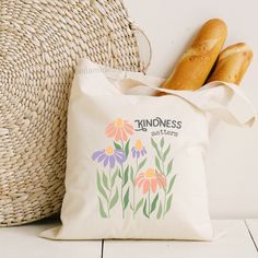 ABOUT OUR TOTE BAGS: This 100% cotton bag comes in one size - 15" x 16"- perfect for everyday wear. The bag features 20" handles (made from the same canvas), making it easy to carry even with a week's worth of shopping. .: 100% cotton canvas .: Heavy fabric (12 oz/yd² (406.9 g/m .: Sewn-in label .: Design is only in the front side of bag *Listing uses mockups photos that depict the final product* CARE INSTRUCTIONS: Do not iron directly over the printed area - print may stick to the iron.; Spot c Tote Bag Summer, Summer Tote Bag, Flower Tote Bag, Tote Bag Aesthetic, Flower Tote, Aesthetic Flower, Canvas Making, Summer Tote, Bag Aesthetic