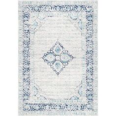 an area rug with blue and white designs