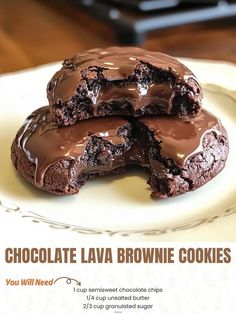 two chocolate lava brownie cookies on a plate