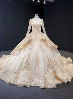 This champagne gown is a royal beauty. The majestic look of the dress is all due to the attractive champagne color of the fabric. The long beautiful train and the voluminous skirt. What enhances the appeal of this dress is the sequins festooned on it in an alluring pattern. Quinceañeras Dresses, Rich Guy, Champagne Ball Gown, Quincenera Dresses, Champagne Color Dress, Long Sleeve Ball Gowns, Formal Ball Gown, Teen Outfits, Fantasy Wedding