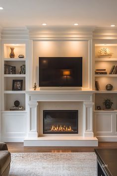 a living room filled with furniture and a flat screen tv mounted above a fire place