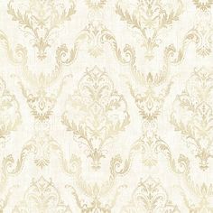 a white and gold wallpaper with an ornate design