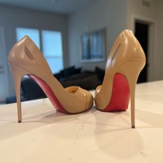 Christian Louboutin Academa 120 Nude Pumps In Size 40 (Size 9.5-10us). A Low-Cut Vamp, Partially Hidden Platform, With Subtle Cutouts, 120mm Peep-Toe Pump In Nude Leather. Purchased Shoes At Barney's While On A Business Trip And Only Ever Put It On While Trying In The Store And Once Again At Home. Never Worn! I Have Wide Feet, So This Style Did Not End Up Suiting My Feet. Comes In Original Box, With The Red Shoe Bags And The Extra Heel Taps That Came With It. Purchased At $945.00 Us. Calf Leather Heels With Red Sole And Open Heel, Open Toe Calf Leather Heels With Red Sole, Open Toe Heels With Red Sole In Calf Leather, Open Toe Heels With Red Sole And Calf Leather, Calf Leather Open Toe Heels With Red Sole, Almond Toe Heels With Red Sole In Calf Leather, Calf Leather Heels With Red Sole And Almond Toe, Luxury Beige Heels With Contrasting Heel Counter, Designer Beige Heels With Contrasting Heel Counter