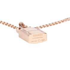 This Necklace is in 18k rose gold and set with 19 diamonds totaling .09 carats. Origin: France Condition: Pristine; new or never worn Accompanied by: Hermes box and dustbag Measurements: Length: 16 in, Pendant 0.72" x 0.5" Luxury 14k Rose Gold Necklaces, Luxury Rose Gold Necklace For Anniversary, Luxury Pink Gold Necklace For Formal Occasions, Timeless Rose Gold Diamond Necklace For Everyday Luxury, Timeless Rose Gold Diamond Pendant Necklace, Rose Gold Diamond Necklace For Everyday Luxury, Luxury Rose Gold Diamond Necklace For Formal Events, Luxury Rose Gold Necklaces, Luxury 14k Rose Gold Jewelry In Pink Gold