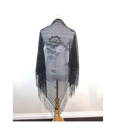 Long Black Fringe Shawl Details: - Fringe Bottom - Triangle Shoulder Shawl. Rests on the shoulders - Sheer with floral details - Made From Synthetic Materials - Lightweight Measurement's (Lying Flat): Length (Including Fringe): 45" Width: 66.5" Size: OS Material: Synthetic Materials  Brand: N/A Condition: Great Please read the policies before making your purchase ♥ If you would like to purchase multiple items contact me for reduced shipping! Feel free to contact me with any questions or concerns Stevie Nicks Shawl Pattern, Stevie Nicks Shawls, Witchy Shawl, Goth Shawl, Stevie Nicks Shawl, Black Fringe Shawl One Size, Shoulder Shawl, Stevie Nicks Style, Fringe Shawl