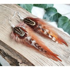 Carefully handcrafted with super soft real feathers, these funky & quirky long brown & white stripy boho feather earrings are comfortable to wear all day long and great for any occasion. Feathers: 10-12cm (4-5") Made with silver or gold plated earring hooks, lever back hoops or clip-ons. Sent in a gift box to ensure safe delivery. All packages are sent by priority mail with a tracking number for your convenience and peace of mind. x Handmade in Germany x My other products can be found here: bysa Bohemian Feather Earrings For Festivals, Brown Feather Dangle Earrings, Bohemian Dangle Feather Earrings, Bohemian Dangle Earrings With Feathers, Bohemian Brown Feather Jewelry, Festival Feather Dangle Jewelry, Earrings Funky, Quirky Earrings, Boho Feathers