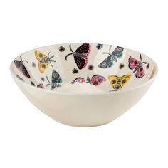 a white bowl with colorful butterflies on it