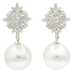 18K White Gold South Sea Pearl 13-14 mm Diamonds Round 0.80 Carats Earrings measuring 1.25" long X 3/4 of an inch wide Pearl Diamond Dangle Earrings, Dangle Pearl Earrings, Fine Pearl Jewelry, Expensive Diamond, Marquise Shape Diamond, Diamond Cluster Earrings, Pearl And Diamond Earrings, Diamond Dangle Earrings, Sea Pearl