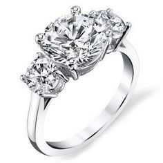 three stone diamond engagement ring in white gold