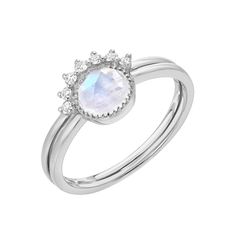 This wonderful two-ring set features a 5.0mm rose cut rainbow moonstone bezel set on a high polish band, paired with a simple semicircle of prong-set diamonds. A fantastic choice for an alternative bride. This ring is available to order in other sizes and colored stones. Some color combinations may require a special order. Please note that due to the unique nature of natural gemstones no two are ever completely alike, and your stones might appear slightly different than those used in featured im White Moonstone Jewelry With Single Cut Diamonds, White Gold Stackable Moonstone Ring, Silver Moonstone Ring With Single Cut Diamonds, White Gold Moonstone Ring With Rose Cut Diamonds, Luxury Moonstone Ring Gift With Bezel Setting, Minimalist Gold Moonstone Ring With Bezel Setting, Minimalist Moonstone Ring With Bezel Setting, Moonstone Diamond Ring With Bezel Setting, Luxury Moonstone Ring With Bezel Setting