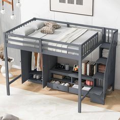 a bunk bed with drawers underneath it in a room