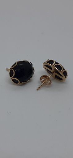 14K Solid Yellow Gold Natural and Smooth Oval Shape Onyx 10x7mm Stud Earrings. Product Info: -Dimensions:10mm x 7mm. -Metal: 14k -Finish: Yellow Gold -Stones : Oval Smooth Onyx. - Made in USA. -Nice Gift box is include. Black Oval Earrings For Anniversary, Classic Black Oval Earrings, Black Oval Pierced Earrings, Lover Jewelry, Gold Earring, Yellow Gold Earring, Gold Stud, Solid Yellow, Black Onyx