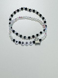 Halloween BOO Ghost bracelet. Standard women's size is 7 inches. You will have the option of the Boo bracelet, the black and iridescent bracelet or both bracelets. To measure wrist please tie a string around and add .25-.5 inches depending on how you would like your bracelet to sit. If you have any questions or custom orders please don't hesitate to message me first. * this bracelet is made to order with love for you so there will be no returns FREE SHIPPING ON ORDERS OF 35+ Boo Bracelet, Ghost Bracelet, Scary Farm, Beaded Ideas, 2024 Jewelry, Pony Bead Bracelets, Bracelets Ideas, Halloween Bracelet, Halloween Beads