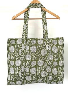 "This Handmade block print,kantha bag made from 100% cotton. Inside square pocket.  Perfect for beach visits/quick grocery runs/carrying kids items or Artist paint book & paints.   Handles that are long enough to go over shoulder and bag does not have any stabilizer in the base so can be folded and stored in your handbag or car for shopping days. OR make a good sustainable Gift.   Gorgeous prints of hand printed cotton are brought together to give an alternate to plastic bags usage. Material - 1 Rectangular Block Print Bags For Daily Use, Green Reversible Rectangular Bag, Green Reversible Rectangular Shoulder Bag, Reversible Green Rectangular Shoulder Bag, Green Rectangular Reversible Shoulder Bag, Eco-friendly Reversible Rectangular Shoulder Bag, Eco-friendly Reversible Rectangular Bag, Green Rectangular Cotton Beach Bag, Kantha Bag