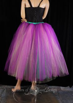 "Mardi gras inspired floor length tulle skirt! This tutu skirt is handmade from 35yards, three layers of soft smooth bridal tulle. We layer Purple tulle on top, gold Iridescent/glimmer Bridal tulle in the middle with green tulle on the bottom. All layers of tulle are tightly machine gathered, serged and sewn to the fabric covered sewn elastic waistband. Since tulle is semi sheer, we have also added a green stretch knit underskirt, to keep the tutu from being see through. This tutu is fully sewn, Sisters Of The Moon, Purple Tulle, Carnival Wedding, Green Tulle, Tulle Tutu Skirt, Tulle Tutu, Tutu Skirt, Fabric Covered, Petticoat