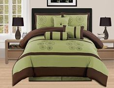 a bed with green and brown comforters in a room