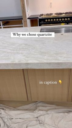 a kitchen counter that is under construction with the words why we chose quartzite in caption