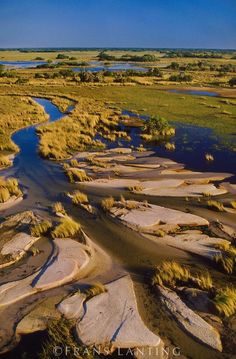 an aerial view of a river in the desert