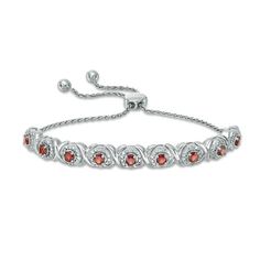 Certain to steal her attention, this shimmering gemstone and diamond bolo bracelet perfects her tailored evening attire. Crafted in sterling silver, this formal style dazzles with a center row composed of nine side-by-side 3.0mm regal red garnets. Petite bright white diamonds wrap each stone in a glittering embrace, while sculpted details complete the look. Radiant with 1/10 ct. t.w. of diamonds and a brilliant buffed luster, this sparkling design adjusts up to 9.5 inches in length and secures w Zales Zales, Simple Silver Jewelry, Bolo Bracelet, Diamond Frame, Blue Stone Ring, 925 Silver Jewelry, Formal Style, Silver Chain Necklace, Gemstone Bracelets