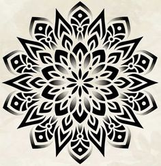 an intricate black and white flower design