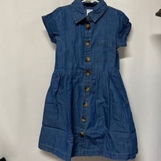 Girls Blue Denim Dress Brand New Size 6x Fully Button Down Lightweight And Super Cute Approx 26” In Length Denim Blue Cotton Dresses With Buttoned Pockets, Button-up Denim Blue Cotton Dress, Denim Blue Cotton Button-up Dress, Blue Cotton Denim Dress With Buttoned Pockets, Blue Cotton Denim Dress With Buttons, Medium Wash Cotton Dress With Buttoned Pockets, Button-up Cotton Denim Dress, Denim Blue Cotton Dresses With Snap Buttons, Cotton Button-up Denim Dress With Snap Buttons