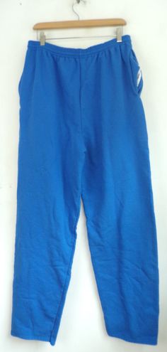 "-Description- >Champion bright blue sweatpants >elastic waist >drawstring at the waist >open bottom >size XL >awesome! >condition: great - name written on the interior tag >color(s): blue >fabric(s): 50 cotton / 50 polyester >brand: champion >care: machine wash -Measurements- >size: XL ✩ all measurements are taken with the item laying flat & some sizes are estimates so please check measurements ✩ waist: 32-35\" / 81-89cm inseam: 33\" / 84cm rise: 16\" / 4 Blue Sweats With Pockets And Relaxed Fit, Blue Relaxed Fit Sweats With Pockets, Blue Relaxed Fit Sweats For Jogging, Blue Jogging Sweats With Pockets, Blue Sweats With Pockets For Jogging, Blue Sweatpants With Elastic Waistband For Jogging, Blue Sweatpants For Jogging, Blue Jogging Pants With Elastic Waistband, Blue Jogging Bottoms With Elastic Waistband