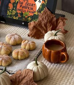 pumpkin cookies and coffee are on the table