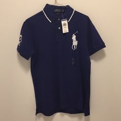 This Is A Blue Ralph Lauren Usa Polo And It Has Never Been Worn And It Includes The Tag Blue Fitted Collared T-shirt, Blue Collared Polo Shirt For Spring, Blue Polo Collar Shirt For Spring, Fitted Blue Polo Shirt For Spring, Blue Collared T-shirt For Spring, Blue Ralph Lauren Cotton Tops, Blue Ralph Lauren Polo Shirt, Blue Ralph Lauren Crew Neck T-shirt, Ralph Lauren Blue Polo Collar Shirt