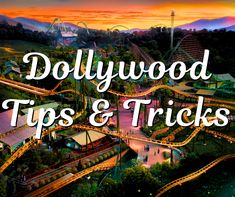 the hollywood tips and tricks sign over an aerial view of a roller coaster at dusk