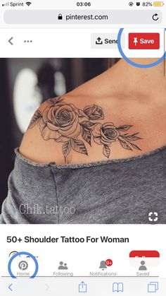 the back of a woman's shoulder with roses on it and an arrow in the middle