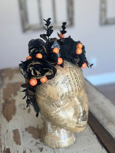 This gorgeous gothic crown features black roses with glittering gold edging, accented with copper glittered black eucalyptus sprays, with glittering orange berries tucked in, on a sturdy headband lined with black leaves, and featuring a silver skull in the center. base is a sturdy headband for a secure fit  Perfect for your Halloween costume! One of a kind and ready to ship! Halloween Costume Accessories With Round Crown, Tall Crown For Halloween Costume Party, Gothic Halloween Headpiece With Round Crown, Gothic Round Crown Headpiece For Halloween, Halloween Crown Costume Accessories, Halloween Masquerade Crown Costume Accessories, Halloween Costume Crown Accessories, Halloween Costume Party Crown Accessories, Halloween Party Costume Accessories With Tall Crown