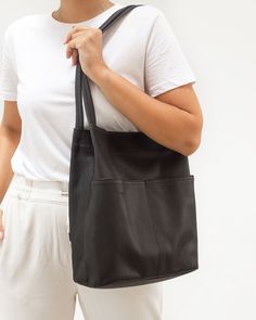 Rome Shoulder Bag - Black – Liberté Leather Everyday Black Shoulder Bag With Pockets, Black Hobo Bag With Pockets For Everyday Use, Black Bucket Bag With Pockets For Daily Use, Black Shoulder Bag For Everyday Use In Fall, Black Bucket Bag With Pockets For Everyday Use, Black Bucket Bag With Zipper Pocket For Daily Use, Solid Color Shoulder Bag For Everyday Use In Fall, Solid Shoulder Bag For Everyday Use In Fall, Black Hobo Bag With Zipper Pocket For Everyday