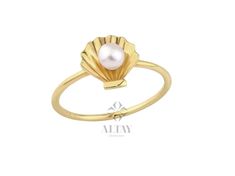 ABOUT PRODUCT  This 14k gold pearl shell gold ring is suitable gift for girlfriend, mom and her. You can even buy as a birthday gift for your friends or anniversary gifts, If you want to add a special note we can write for you and put to inside of package. We manufacture our jewelry pieces with carefully and after production we double checking in quality control department. Our main idea is keep our items for daily wearing especially for minimalist jewelry pieces. 14k Gold Seashell Pearl Ring, Gold Shell Ring, Dainty Gold Bridesmaid Ring, Gift For Her, Charm Ring,Minimal Fashion Summer Jewelry, Gift for Her, Valentine's Day Gift, Christmas, Anniversary Gift, New Year, Mothers Day, Valentines Day, Birthday Gift, Fathers Day ITEM DETAILS Material: 14K Gold Approx: 1.90 gram Available colors: Gold Shell-shaped Jewelry For Gifts, Elegant Shell-shaped Ring For Gifts, Minimal Fashion Summer, Adjustable Gold Shell Ring, Gold Shell-shaped Gift Ring, Elegant Shell-shaped Jewelry With Pearl Charm, Pearl Ring Gold, Dainty Gold Band, Unique Gold Rings