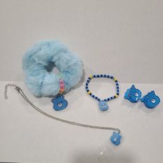 Care Bears Blue Grumpy Bear Fashion Necklace, Beaded Bracelet, 2 Small Hair Claw Clips & Fuzzy Plush Scrunchie With Charm May Have Minor Manufacturers Inconsistencies. The Items Sold Are The Exact Same Items In The Pictures Here Care Bears Grumpy Bear, Bear Fashion, Small Hair Claw, Grumpy Bear, Hair Claw Clips, Bear Necklace, Claw Clips, Necklace Beaded, Care Bears