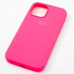 a pink iphone case sitting on top of a white surface with a heart sticker