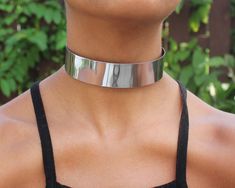 "Similar in design to my Ankle Cuffs, available in the link below, the choker is a simple design that adds A LOT of oomph to your look. The 1\" thick choker looks great on any complexion and is a chic nod to 90's fashionistas like the ladies of Clueless (my favorite movie) ! A metal choker can be very uncomfortable- I keep them easy to wear with very malleable, flexible materials! Readily available sizes are Small (14\"), Medium (15\") and Large (16\") although I TAKE CUSTOM ORDERS so feel free Thick Choker Necklace, Thick Choker, Metal Choker Necklace, Choker Necklace Silver, Women Choker Necklace, Choker Necklace Designs, Alien Girl, Metal Choker, Womens Chokers