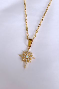 ♥Stunning Opal Star Necklace with crystal details and a gold chain ♥Beautiful on its own or layered ♥MATERIAL -16K gold plated over brass Plated jewelry is a wonderful, affordable way to add a sophisticated look to your wardrobe, with the look of real gold. It is also an excellent choice for people with sensitive skin. Celestial Starburst Necklace With Star Charm, Gold Starburst Necklace With Star Charm, Opal Necklace Gold, North Star Necklace, Jewelry Star, Starburst Necklace, Necklace Star, Necklace Opal, Opal Necklace