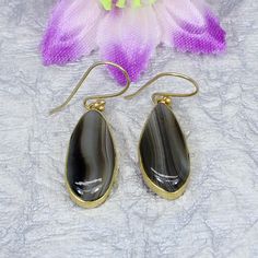 Botswana Agate Earring- Large Stone Earrings- Gemstone Earrings- Gold Plated Earrings- Handmade Earrings- Gift For Friend- Dangle Earrings Product Details : Gemstone : Botswana Agate Metal : Brass Material : Brass & Gemstone Weight : 7.81 Gram Approx Stone Size : 24 x 11 MM Approx Product Code : HE-1217 Handmade Items **Made To Order** Here is the link for more designs : https://www.etsy.com/shop/HermosaEarrings Gold Agate Teardrop Earrings, Gold Teardrop Agate Earrings, Agate Earrings With Ear Wire For Gift, Teardrop Agate Earrings For Gift, Teardrop Agate Earrings As Gift, Agate Teardrop Earrings For Gift, Brass Earrings Handmade, Gemstone Earrings Gold, Earrings Gemstone