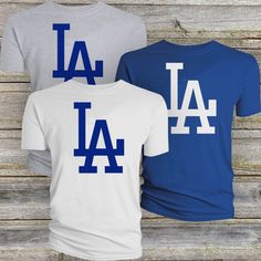 Definitely an eye catcher. Please pay attention to the size chart for best fit. Choose one size up for loose fit. 100% Cotton except for Gray & Charcoal. 30-Day Return policy is honored as long as item is returned in good unworn condition. Dodgers Tshirt, Los Angeles Graphic, Pay Attention, Return Policy, Gender Neutral, Loose Fitting, Bathing Beauties, Size Chart, Adult Outfits