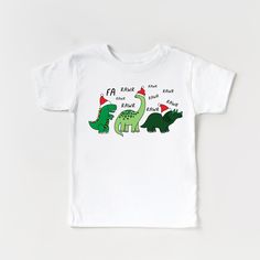 A perfect addition to your little ones winter wardrobe! This super cute Dinosaur Merry Christmas tshirt comes in baby, toddler and youth sizes. It is the perfect shirt for festive family outings like caroling, making christmas cookies, drinking hot cocoa, looking at christmas lights and more!  ----WASHING INSTRUCTIONS----- - Please turn the tee inside out before washing - Cold machine wash in gentle cycle - Do not bleach - Do not dry clean - Do not iron over the HTV Christmas Toddler Shirt, Toddler Christmas Shirt, Dino Shirt, Holiday Graphics, Christmas Shirts For Kids, Matching Christmas Shirts, Family Outings, Dinosaur Shirt, Christmas Tshirt