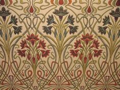 an intricately designed wallpaper with flowers and leaves