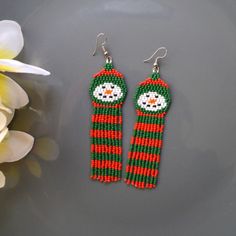 https://mannatdesignco.etsy.com/listing/1587106032 Holiday Dangle Beaded Earrings, Christmas Dangling Bead Earrings, Christmas Colorful Beaded Dangle Earrings, Christmas Beaded Drop Earrings, Christmas Dangle Earrings With Beads, Christmas Dangle Beaded Earrings With Colorful Beads, Christmas Dangle Earrings With Dangling Beads, Christmas Beaded Dangle Earrings With Ear Wire, Christmas Dangle Beaded Earrings With Ear Wire