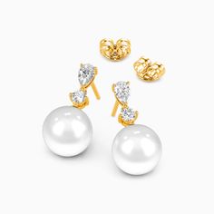 A stunning showcase of elegance and refinement, these drop earrings delight at first glimpse. Each earring features a lustrous pearl suspended with soft grace beneath a pear and round gemstone. The elegant design sways gently with your movements, gleaming subtly to draw admiring eyes. Whether worn for day or evening, the understated luxury of these drops enhances any outfit with impeccable taste and sophistication. *Each piece is handmade, resulting in a potential variance of 0.1-0.2mm during me Elegant Pear-shaped Pearl Earrings For Anniversary, Luxury Teardrop Pearl Earrings, Elegant White Gold Pear-shaped Pearl Earrings, Luxury Pear-shaped Pearl Drop Bridal Earrings, Elegant White Pear-shaped Earrings, Elegant Pear-shaped Pearl Earrings For Evening, Elegant White Pear-shaped Bridal Earrings, Elegant Pear-shaped White Gold Bridal Earrings, Classic Pear-shaped Pearl Earrings With Elegant Design