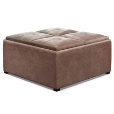 a brown leather ottoman sitting on top of a white floor