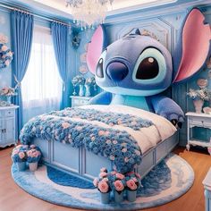 a bedroom decorated in blue and pink with an elephant on the bed