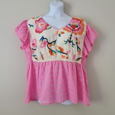 Cato Embroidered Top Size 22/24 Elastic Waist Ruffled Cap Sleeves Floral Embroidered Details 50" Bust, 42" Waist, 27" Length Spring Cotton Embroidered Top With Ruffles, Pink V-neck Top With Floral Embroidery, Cotton Embroidered Top With Ruffles Short Sleeve, Cute Multicolor Embroidered Tops For Spring, Cute Multicolor Embroidered Tops For Summer, Cute Multicolor Embroidery Tops For Spring, Pink V-neck Embroidered Top For Spring, Pink Peplum Blouse For Summer, Pink Short Sleeve Embroidered Top For Spring