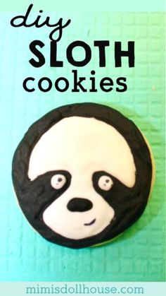 a close up of a cookie with a panda face on it and the words diy sloth cookies